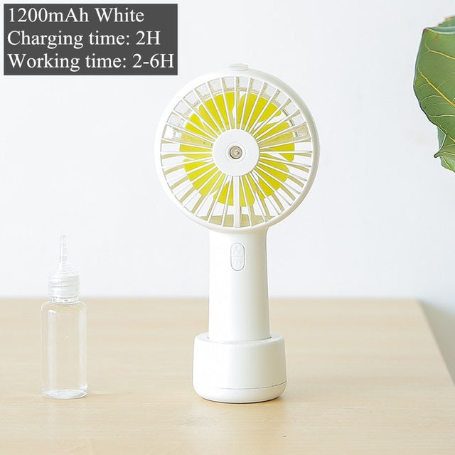 Battery Portable Water Spray Mist Fan Electric USB Rechargeable Handheld Mini Fan Cooling Air Conditioner Humidifier for Outdoor - The Well Being The Well Being 1200mah white Ludovick-TMB Battery Portable Water Spray Mist Fan Electric USB Rechargeable Handheld Mini Fan Cooling Air Conditioner Humidifier for Outdoor